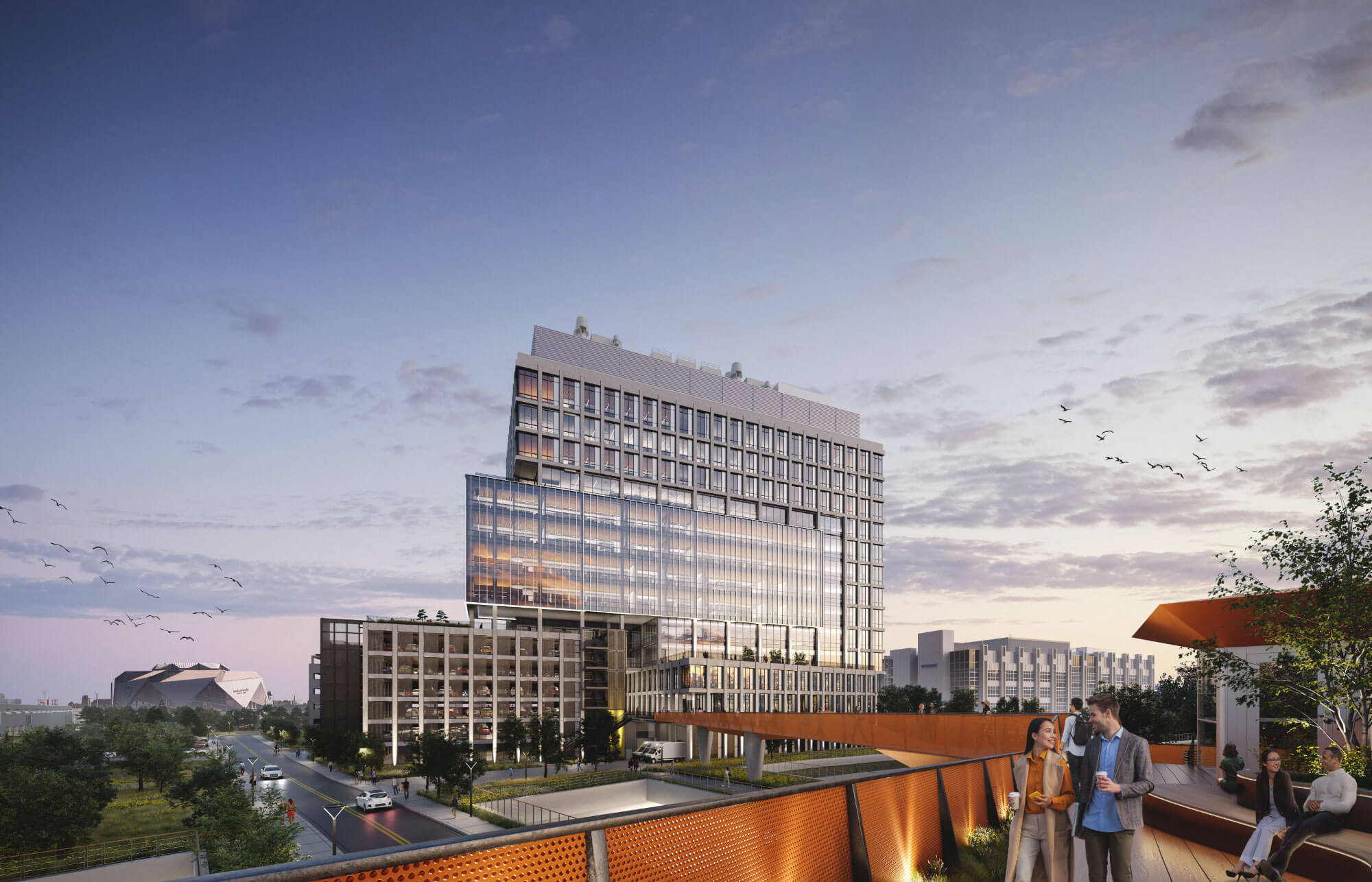 People use the pedestrian bridge by Science Square campus